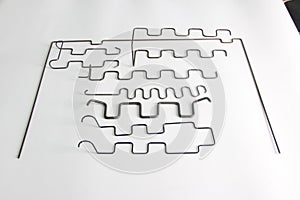 Wire bending forming parts