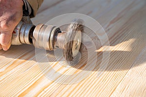 Wire brush for wood working, on a drill.