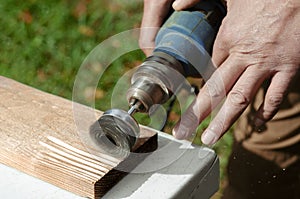 Wire brush for wood working. Tool for treatment wood. Drill with a wire brush