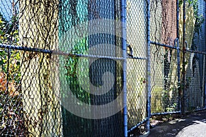 Wire chain link fence securing vacant block