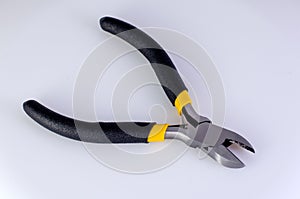 Wire cutters or pliers on a white background
