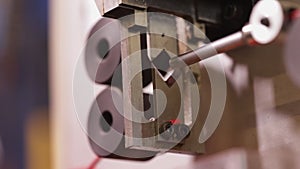 Wire cutting and stripping machine working - extreme close up