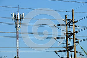 Wire on electrictity post on blue sky