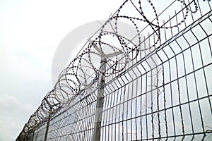 Wire Fence Airport with white sky
