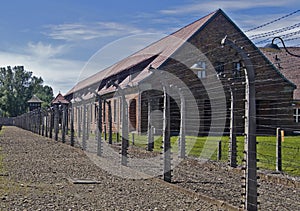 Wire fence and barrack in Auschwitz-Birkenau ca