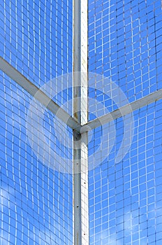 Wire fence on blue sky background