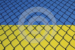 Wire fence over the flag of ukraine photo