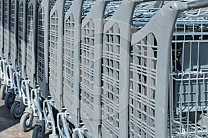 Wire modern supermarket shopping cart, symbol of consumerism