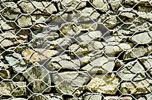 Wire net Gabion Rock Fence in close-up.