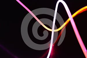 A wire with orange and blue light, a light guide wire with different light transmission, light spectrum, and light effects located