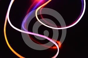 A wire with orange and blue light, a light guide wire with different light transmission, light spectrum, and light effects located