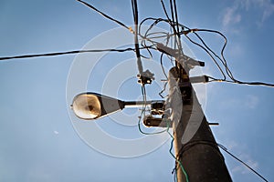 Wire pole with street lamp