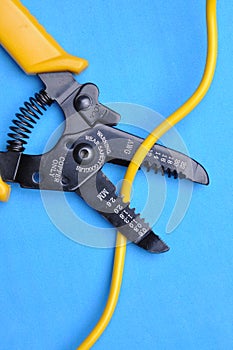 Wire stripper, insulation tape and cable