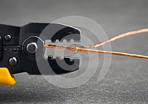 Wire strippers working on copper cable