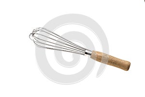 Wire whisk on white background photo
