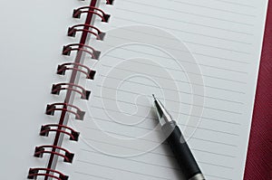 Wirebound Notebook with Black Pen.