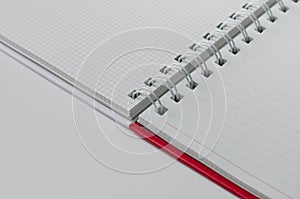 Wirebound Notebook Open with Lined and Grid Paper.