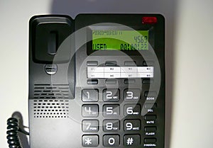 Wired phone for office and home. Telephone with a wire and buttons for telephone communication