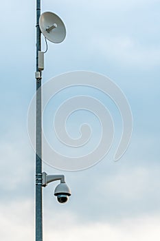 Wireless access point antenna and cctv camera mounted on the pole