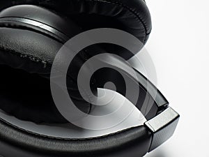 Wireless black headphones on a white background