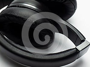 Wireless black headphones on a white background