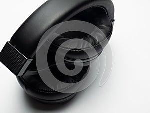 Wireless black headphones on a white background