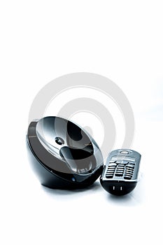 Wireless black telephone with cradle isolated on white background
