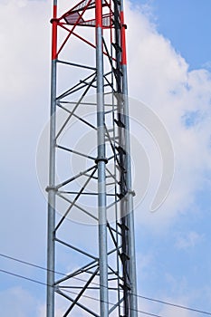 Wireless Communication Antenna With bright sky Telecommunication tower with antennas with blue sky.