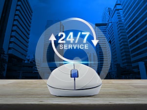 Wireless computer mouse with button 24 hours service icon on woo