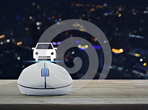 Wireless computer mouse with car front view flat icon on table