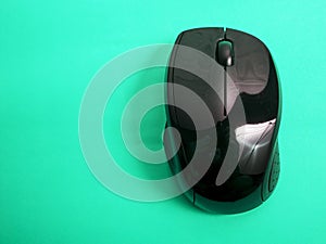 Wireless Computer Mouse on Green Background