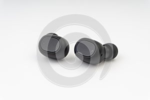 Wireless earbuds or earphones on white background