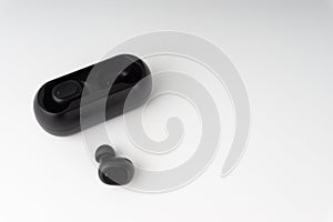 Wireless earbuds or earphones on white background