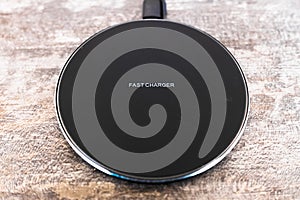 Wireless fast charger for mobile phones, conveniences for modern times