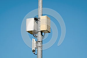 Wireless internet access point antenna on a metal pole