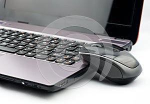 A wireless mouse and a laptop