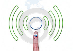 Wireless network green symbol with cercle on finger