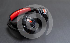 Wireless Over-Ear full size Headphones, Black leather isolated on black background with clipping path.