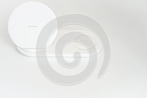 Wireless phone charger in white.