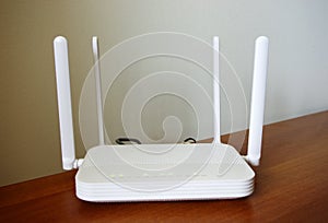 Wireless router on office desk. Internet concept. Internet Security concept. Fiber optic Internet.