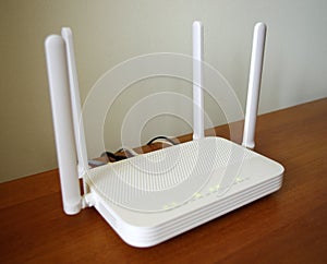 Wireless router on office desk. Internet concept. Internet Security concept. Fiber optic Internet.