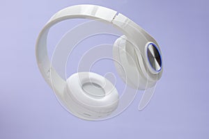 wireless white music headphones.