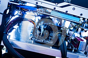 Wires of bitcoin mining machine in a close-up shot.