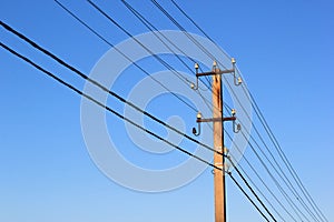 Wires and power line insulators on an electrical pole