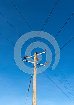 Wires at a wooden telegraph junction pole