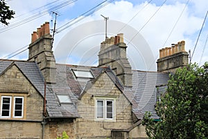 Wiring and striking chimneys in the city Bath.