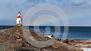 The Wisconsin Point Light is a lighthouse located near Superior on Wisconsin Point Rainbow in the background