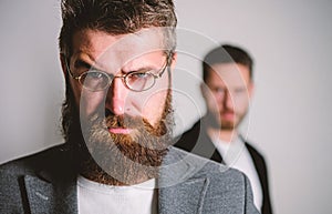 Wise glance. Hipster style and fashion. Hipster eyeglasses. Man handsome bearded hipster wear eyeglasses. Eye health and