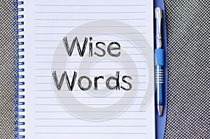 Wise words concept on notebook