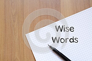 Wise words concept on notebook